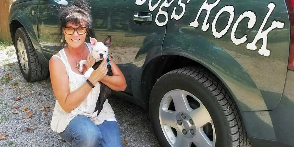 woman holding deaf dog pinterest